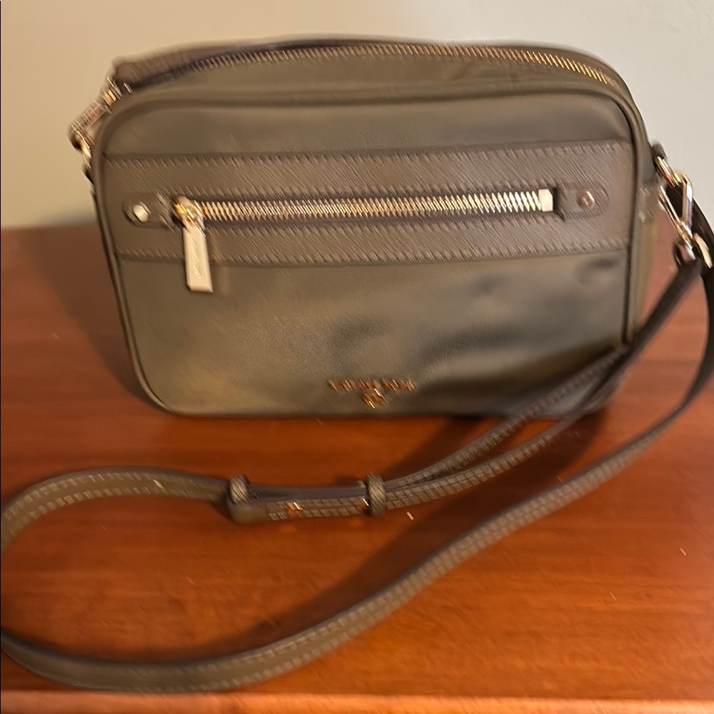 Michael Kors Olive Green Crossbody Bag with Modern Design.  Dust bag included